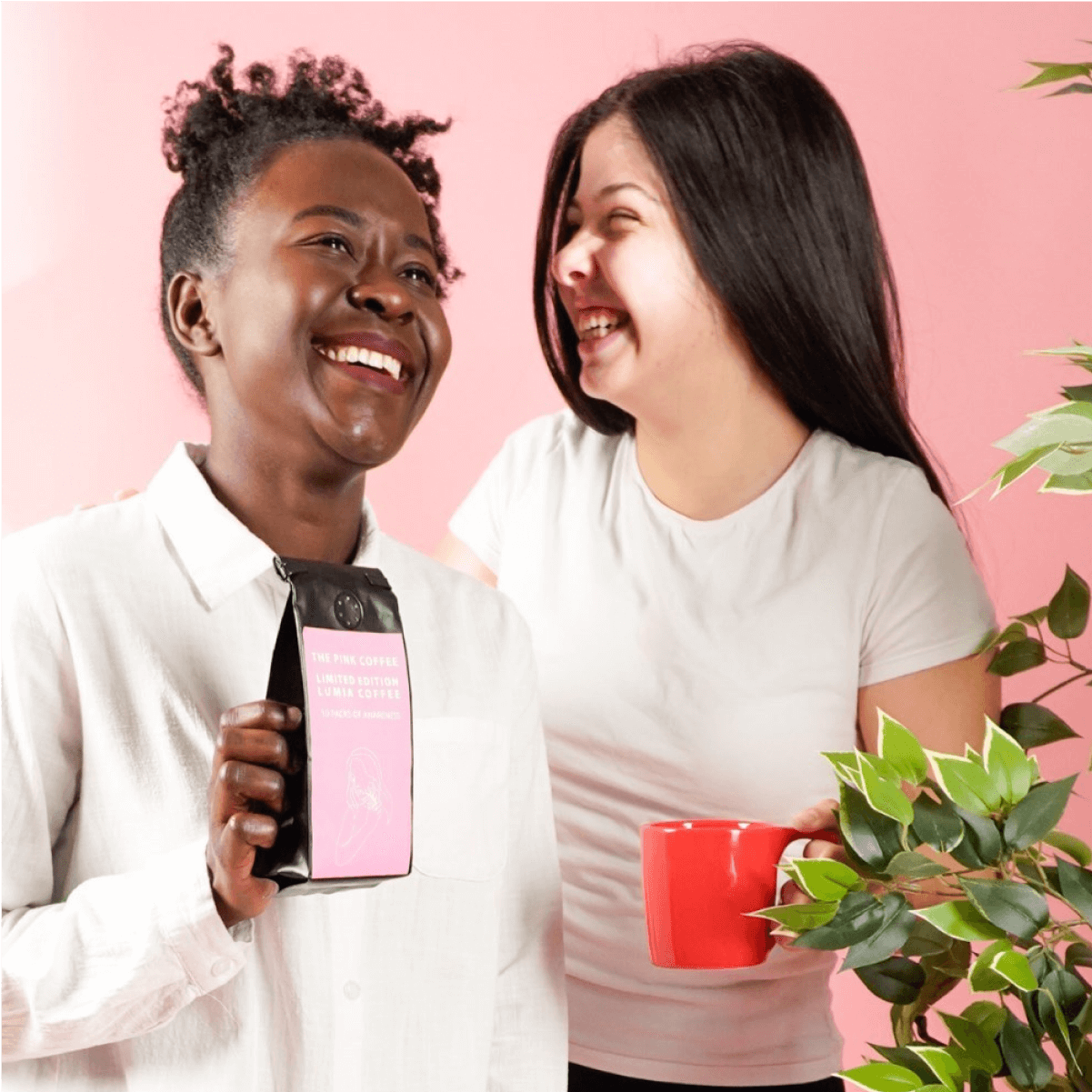 Two women laughing together